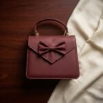 The Dravox Leather Colette Bow Hand Bag